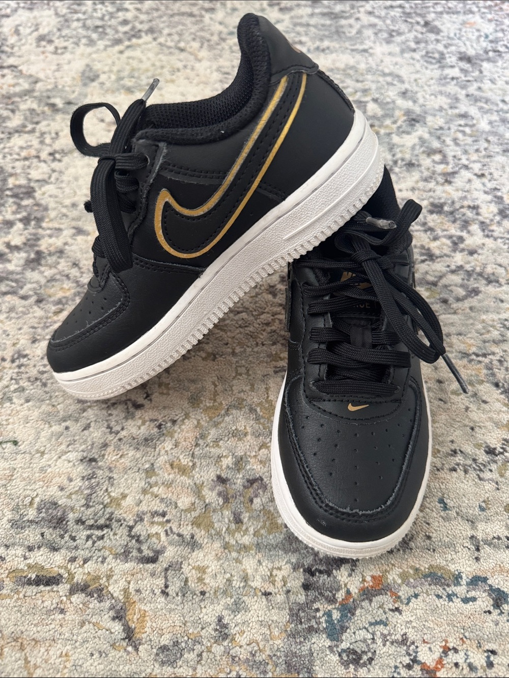 Nike Kids Black Sneakers with Gold Swoosh Air Force 1s size toddler 11c
